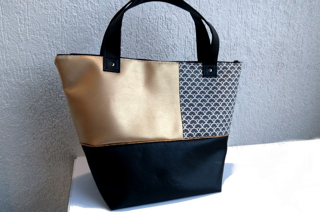sac trapeze noir or eventail posé